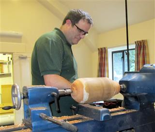 Paul is happy. Big log big lathe